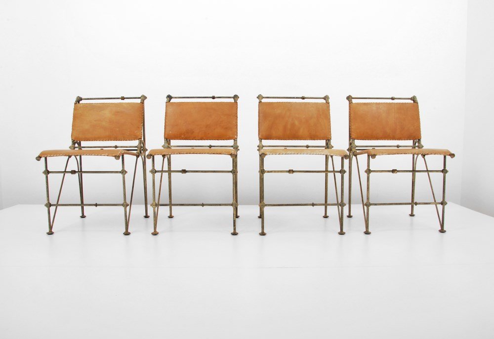 Ilana Goor Chairs, Set of 4: Designer & Manufacturer: Ilana Goor Markings: none Country of Origin & Materials: Israeli; leather, steel Additional Information & Circa: Set of four chairs of hand crafted iron and leather by Israeli