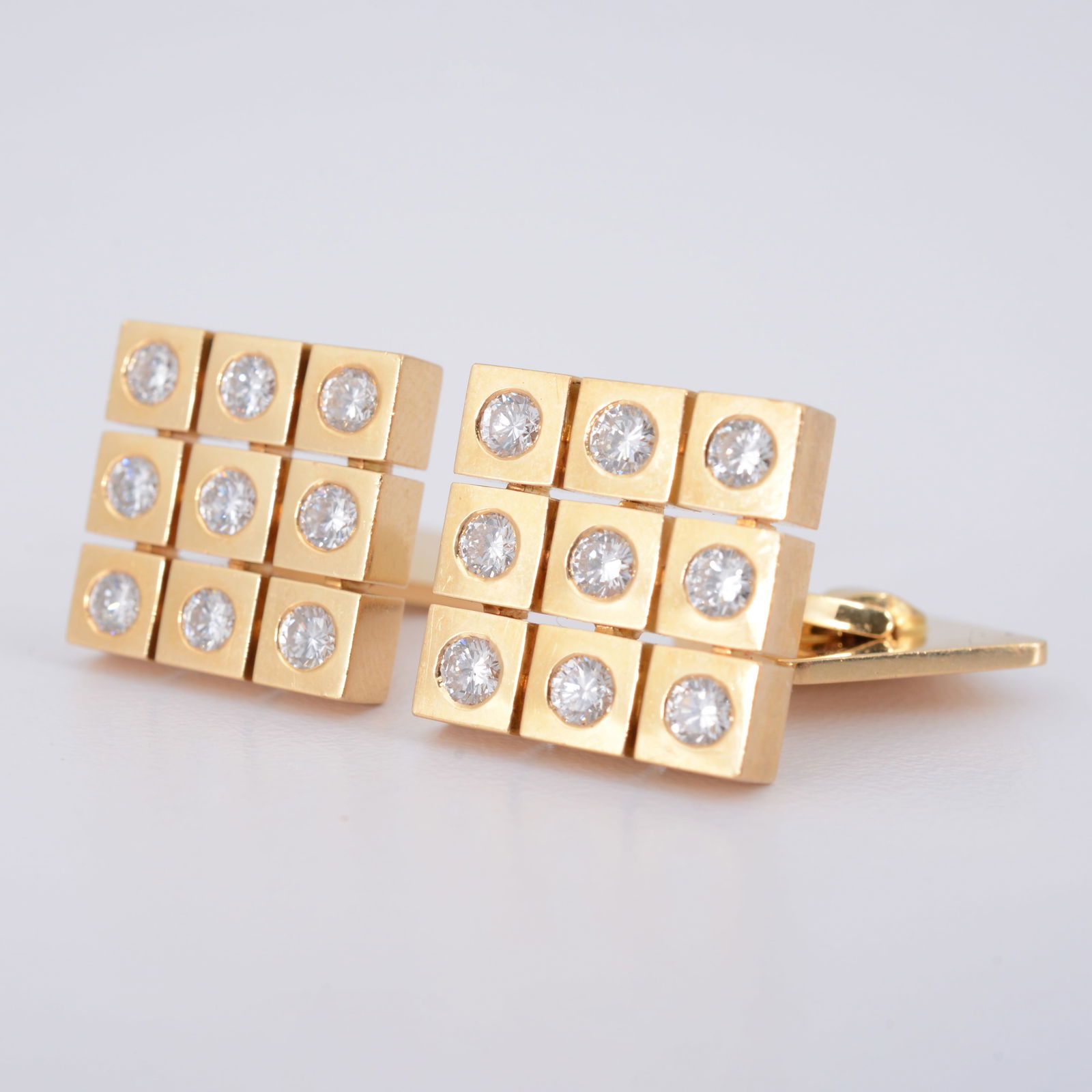 Trudel Gold & Diamond Estate Cufflinks: Artist/Designer/Manufacturer: Trudel Juwelier (Switzerland)Marking(s); notes: Trudel, 750 imprint, marking(s)Materials: 18K gold, diamondDimensions (H, W, D):&n
