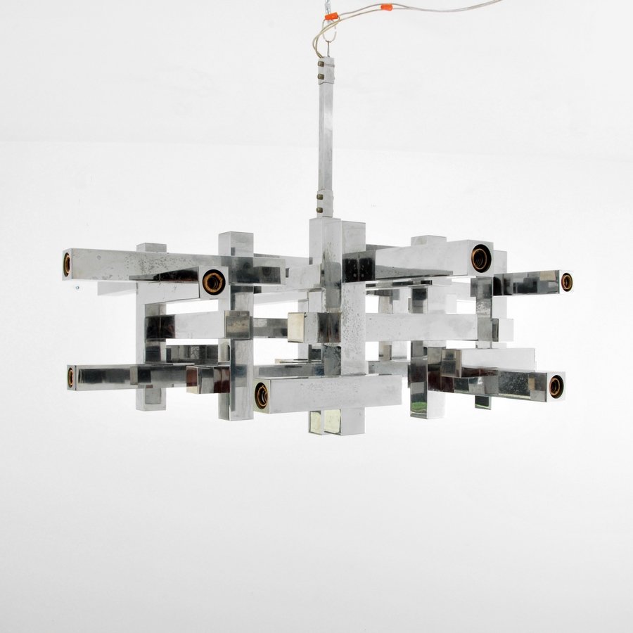 Gaetano Sciolari Chandelier: Designer & Manufacturer: Gaetano Sciolari Markings: none Country of Origin & Materials: Italy; chromed metal Additional Information & Circa: Architectural chandelier by Gaetano Sciolari. (Keyword Sear