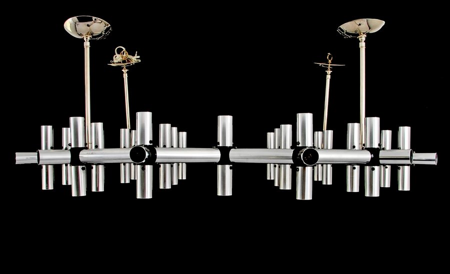 Massive Robert Haussmann "Atom" Chandelier: Designer & Manufacturer: Robert Haussmann; Swiss Lamp International Markings: none Country of Origin & Materials: Switzerland; chromed aluminum, other Additional Information & Circa: Massive "Atom" ch