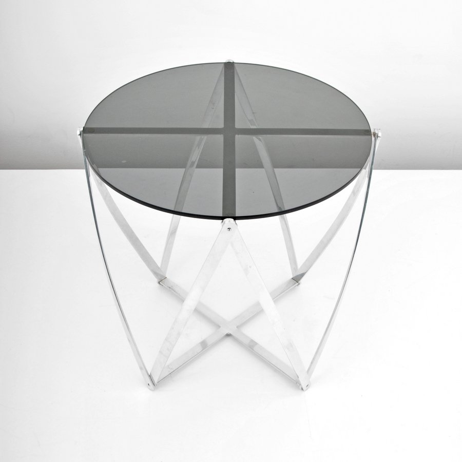 John Vesey Occasional Table: Designer & Manufacturer: John Vesey; John Vesey Inc. Markings: none Country of Origin & Materials: USA; chromed metal, smoked glass Additional Information & Circa: Fine occasional table by John Vesey.
