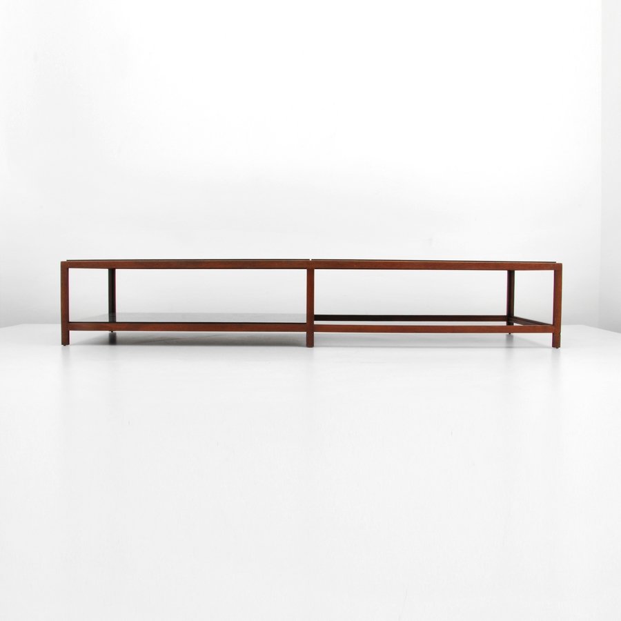 Long Edward Womley Cocktail Table: Designer & Manufacturer: Edward Wormley; Dunbar Markings: marked Country of Origin & Materials: USA; wood, mica Additional Information & Circa: Long cocktail table with shelf by Edward Wormley. (Key W