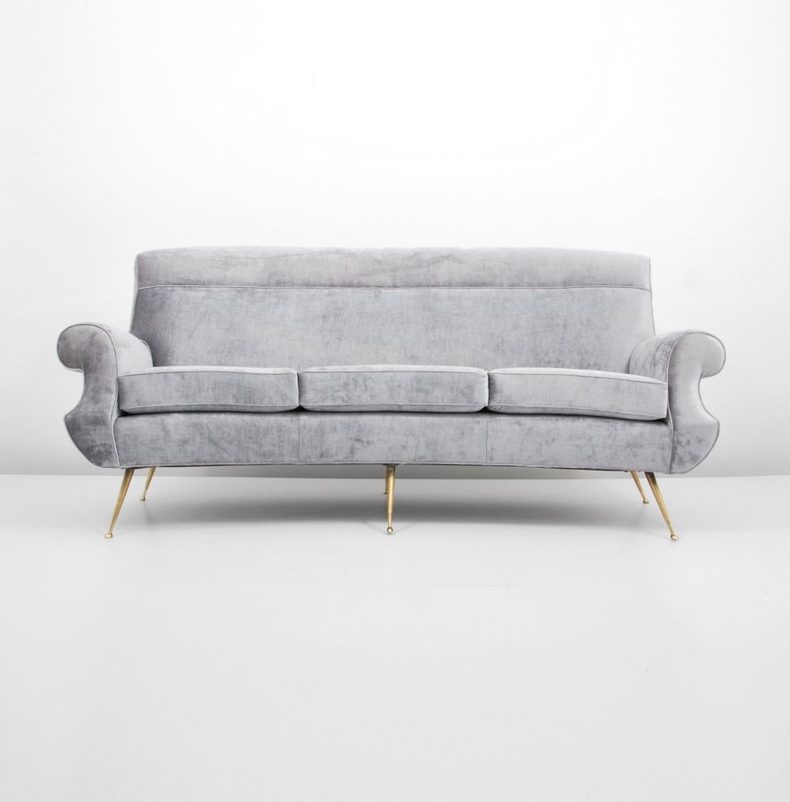 Osvaldo Borsani Sofa: Designer & Manufacturer: Osvaldo Borsani Markings: none Country of Origin & Materials: Italy; brass, upholstery Additional Information & Circa: Fine Italian sofa with brass legs by Osvaldo Borsani. (K
