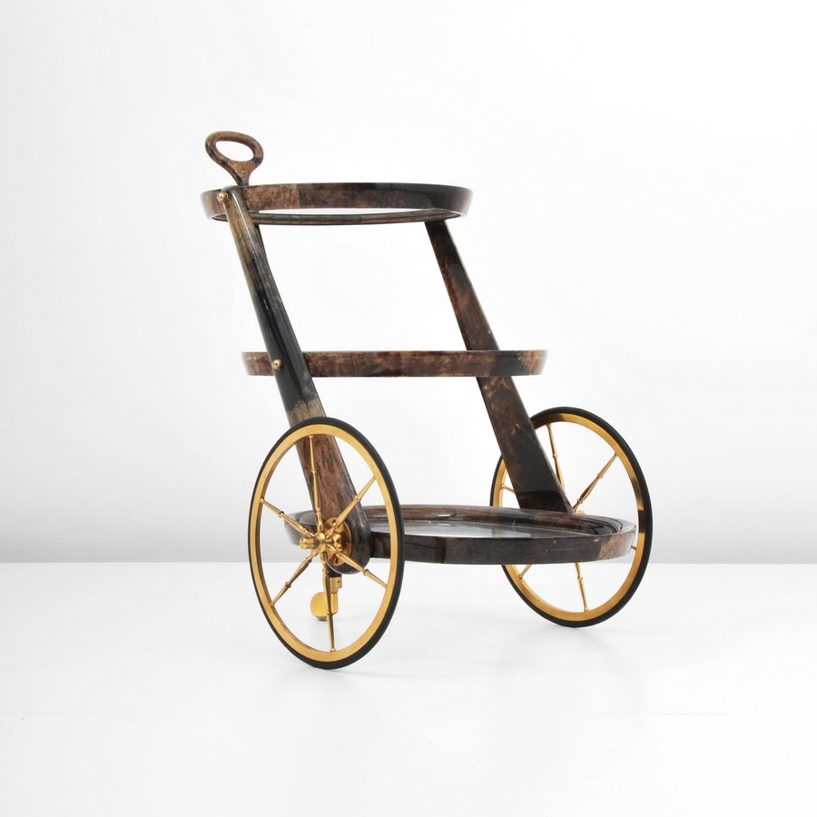Aldo Tura Bar Cart: Designer & Manufacturer: Aldo Tura Markings: none Country of Origin & Materials: Italy; metal, goatskin, other Additional Information & Circa: Three-tiered lacquered goatskin bar cart on wheels by Ald