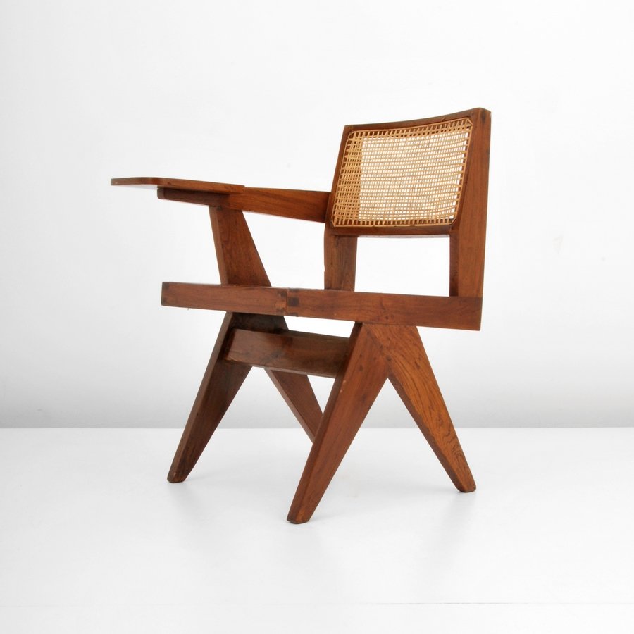 Pierre Jeanneret "Writing Chair": Designer & Manufacturer: Pierre Jeanneret Markings: marked Country of Origin & Materials: France/India; wood, caning Additional Information & Circa: "Writing Chair (Chaise Ecritoire)" arm chair, model
