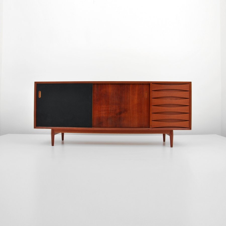 Arne Vodder Cabinet: Designer & Manufacturer: Arne Vodder; Sibast Furniture Markings: marked Country of Origin & Materials: Denmark; teak, other Additional Information & Circa: Cabinet with six drawers and two sliding doo