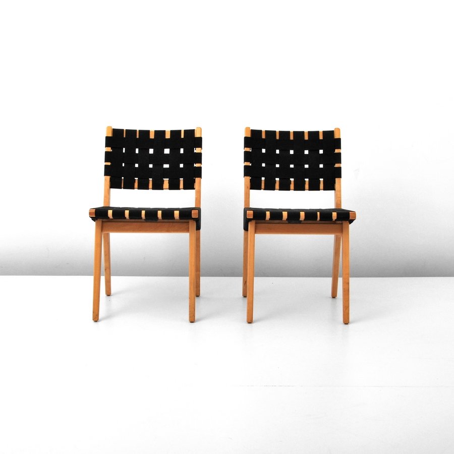 Pair of Jens Risom Chairs: Designer & Manufacturer: Jens Risom; Knoll Associates Markings: marked Country of Origin & Materials: USA; maple, other Additional Information & Circa: Pair of webbed lounge chairs by Jens Risom. (Key