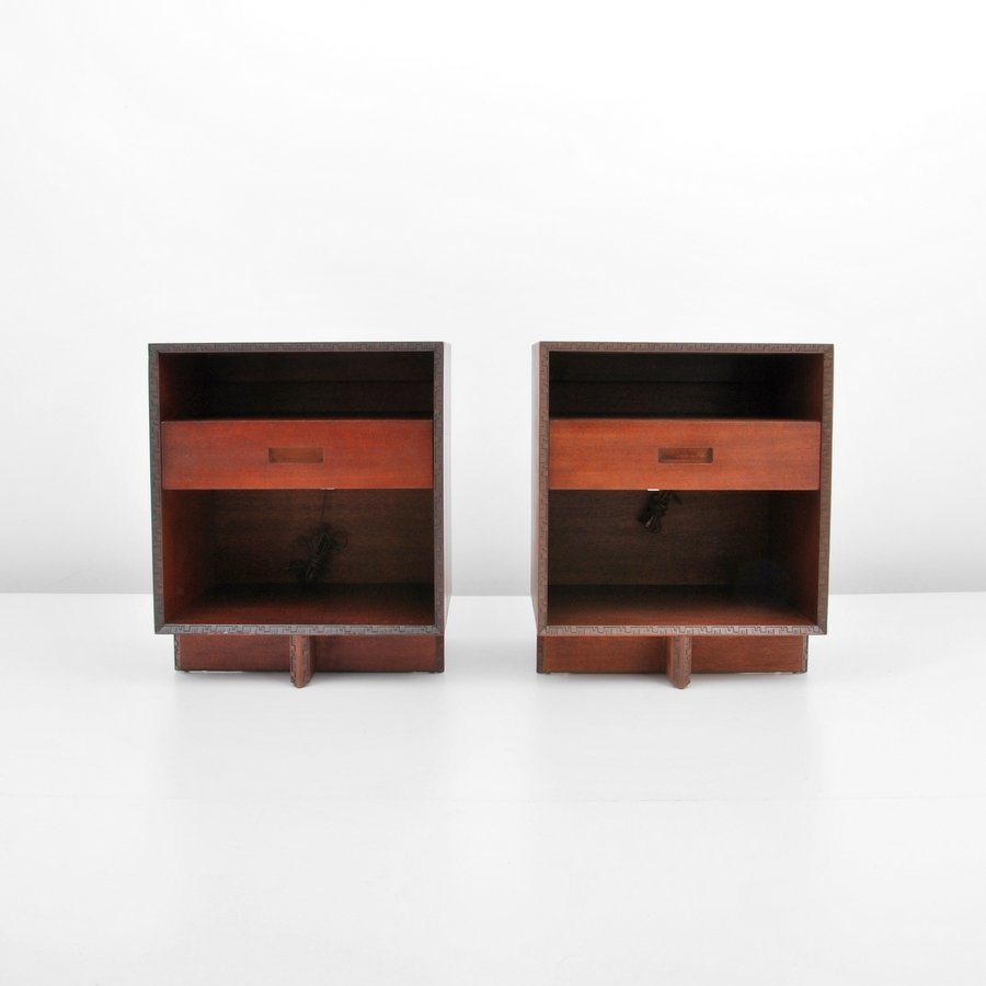 Pair of Frank Lloyd Wright Nightstands: Designer & Manufacturer: Frank Lloyd Wright; Heritage Henredon Markings: marked Country of Origin & Materials: USA; mahogany Additional Information & Circa: Pair of nightstands each with a single draw