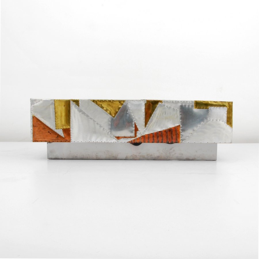 "Patchwork" Cocktail Table, Manner of Paul Evans: Designer & Manufacturer: Paul Evans, Manner of Markings: none Country of Origin & Materials: USA; mixed metal Additional Information & Circa: "Patchwork" cocktail table in the manner of Paul Evans. (K