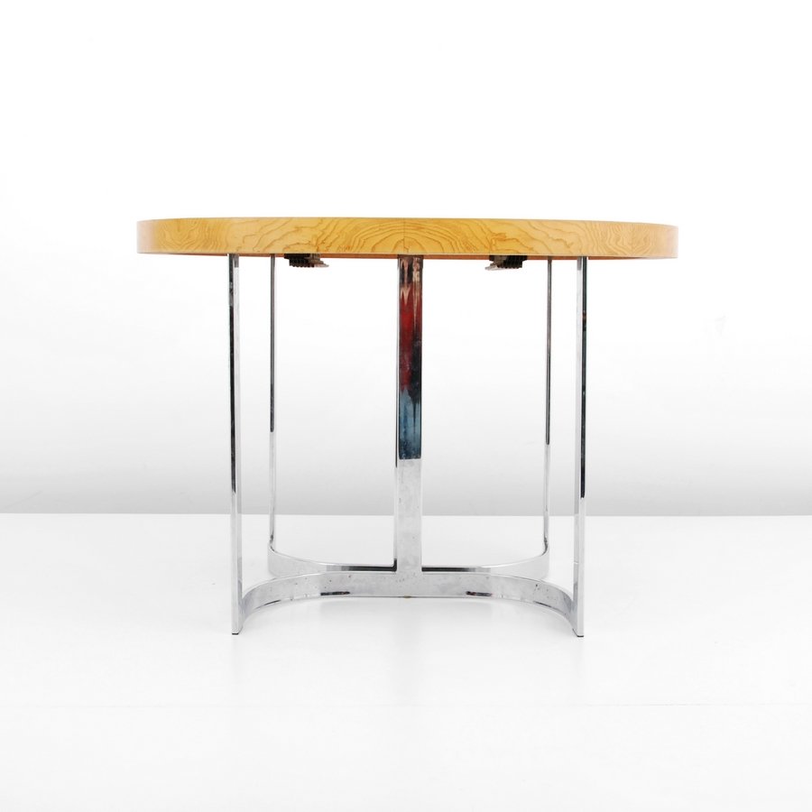 Milo Baughman Dining Table: Designer & Manufacturer: Milo Baughman; Thayer Coggin Markings: none Country of Origin & Materials: USA; chrome, burl wood Additional Information & Circa: Burl wood top dining table with two - 18" lea