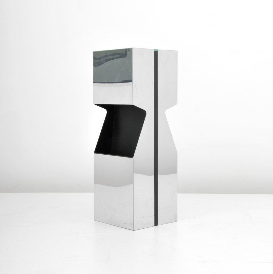 Neil Small Floor Lamp/Magazine Holder: Designer & Manufacturer: Neal Small; George Kovacs Lighting Markings: none Country of Origin & Materials: USA; chromed metal, glass Additional Information & Circa: Floor lamp with magazine holder by N