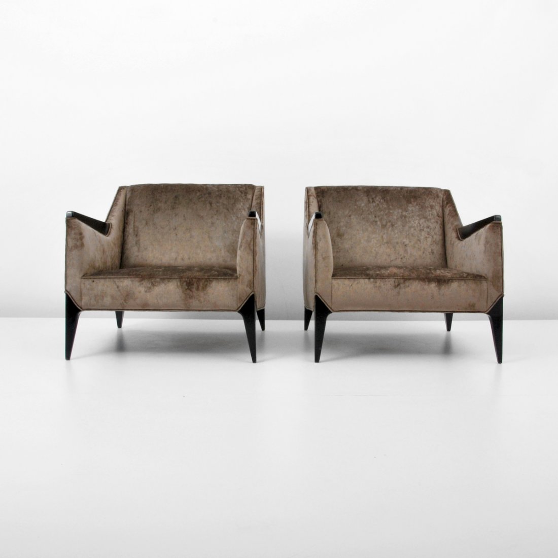 Pair of Lounge Chairs, Manner of Gio Ponti: Designer & Manufacturer: Gio Ponti, Manner of Markings: none Country of Origin & Materials: unknown; wood, upholstery Additional Information & Circa: Pair of lounge chairs in the manner of Gio Ponti.