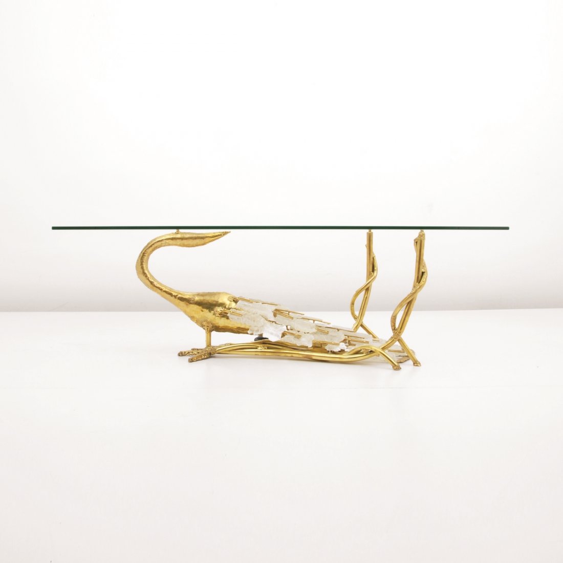 Jacques Duval-Brasseur Cocktail Table: Designer & Manufacturer: Jacques Duval-Brasseur Markings: marked Country of Origin & Materials: France; brass, glass, quartz Additional Information & Circa: Rare "Peacock" form cocktail table by Jacqu