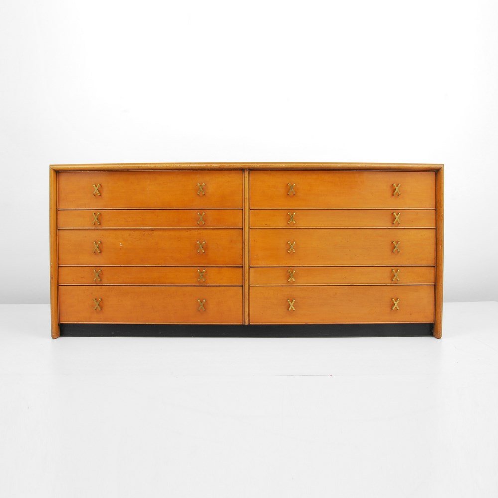 Paul Frankl Dresser: Designer & Manufacturer: Paul Frankl; Johnson Furniture Co. Markings: marked Country of Origin & Materials: USA; wood, metal Additional Information & Circa: Dresser with "X" form handles and ten drawe