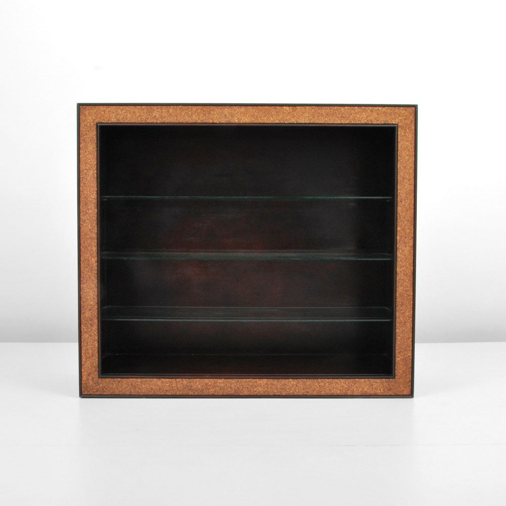 Paul Frankl Bookcase: Designer & Manufacturer: Paul Frankl; Johnson Furniture Co. Markings: none Country of Origin & Materials: USA; wood, cork, glass Additional Information & Circa: Bookcase with cork trim and three adjus