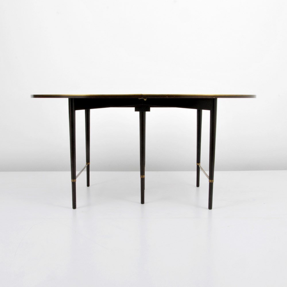 Paul McCobb Dining Table, Connoisseur Collection: Designer & Manufacturer: Paul McCobb; Calvin Markings: marked Country of Origin & Materials: USA; mahogany, brass Additional Information & Circa: Mahogany dining table with brass accents and six 11-in