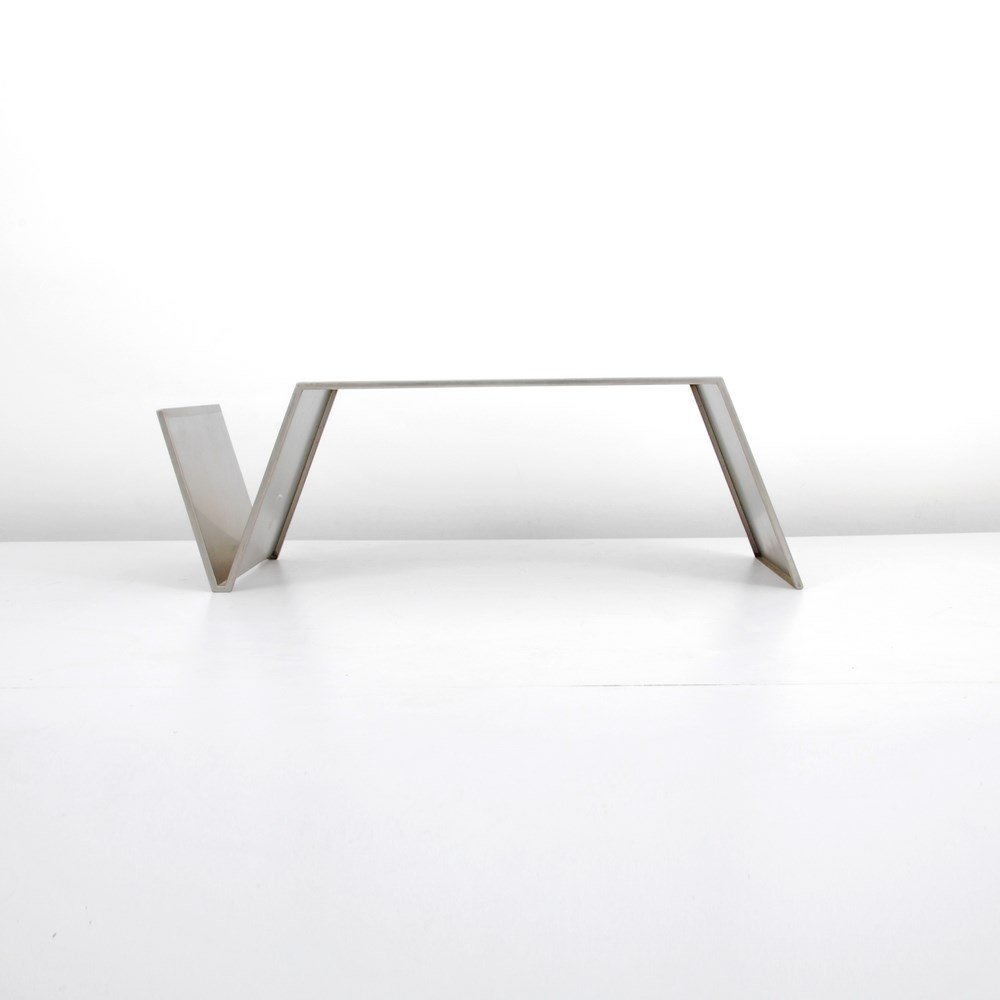 Kappa Cocktail Table With Magazine Rack: Designer & Manufacturer: Kappa Markings: none Country of Origin & Materials: France; stainless steel Additional Information & Circa: Cocktail table with magazine rack by Kappa. (Key Word Search: Paul 