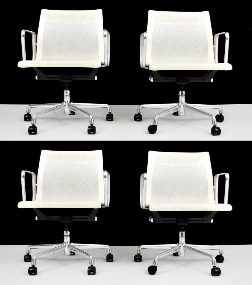 Charles & Ray Eames "Aluminum Group" Chairs, Set of 4: Designer & Manufacturer: Charles & Ray Eames; Herman Miller Markings: none Country of Origin & Materials: USA; aluminum, webbing Additional Information & Circa: Set of four wheeled, swivel and adjusta