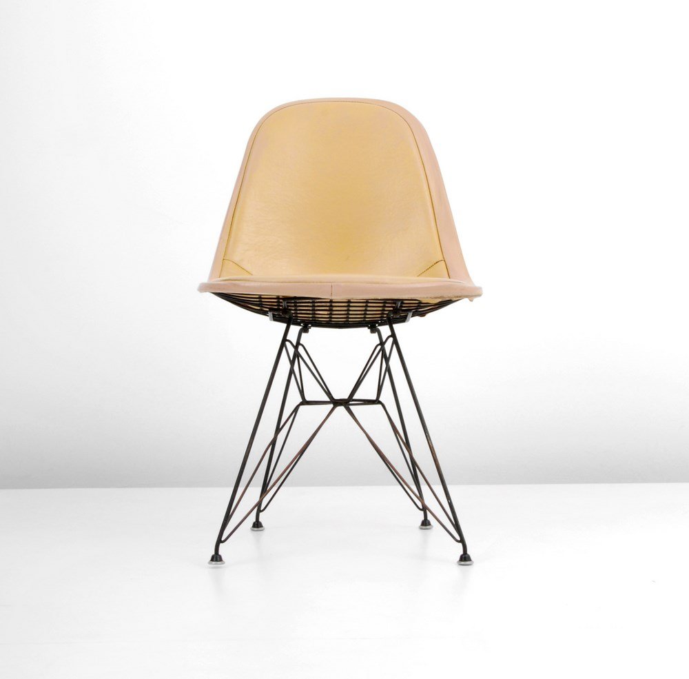 Charles & Ray Eames "DKR Eiffel" Chair: Designer & Manufacturer: Charles & Ray Eames; Herman Miller Markings: marked Country of Origin & Materials: USA; upholstery, metal Additional Information & Circa: "DKR Eiffel" chair by Charles & Ray E