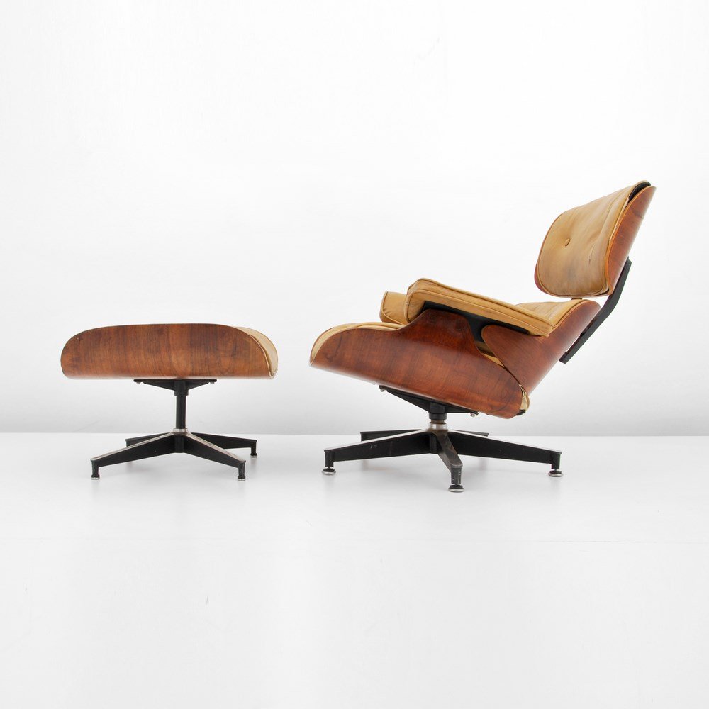 Charles & Ray Eames Rosewood Lounge Chair & Ottoman: Designer & Manufacturer: Charles & Ray Eames; Herman Miller Markings: marked Country of Origin & Materials: USA; rosewood, leather, other Additional Information & Circa: Leather, rosewood and down fil