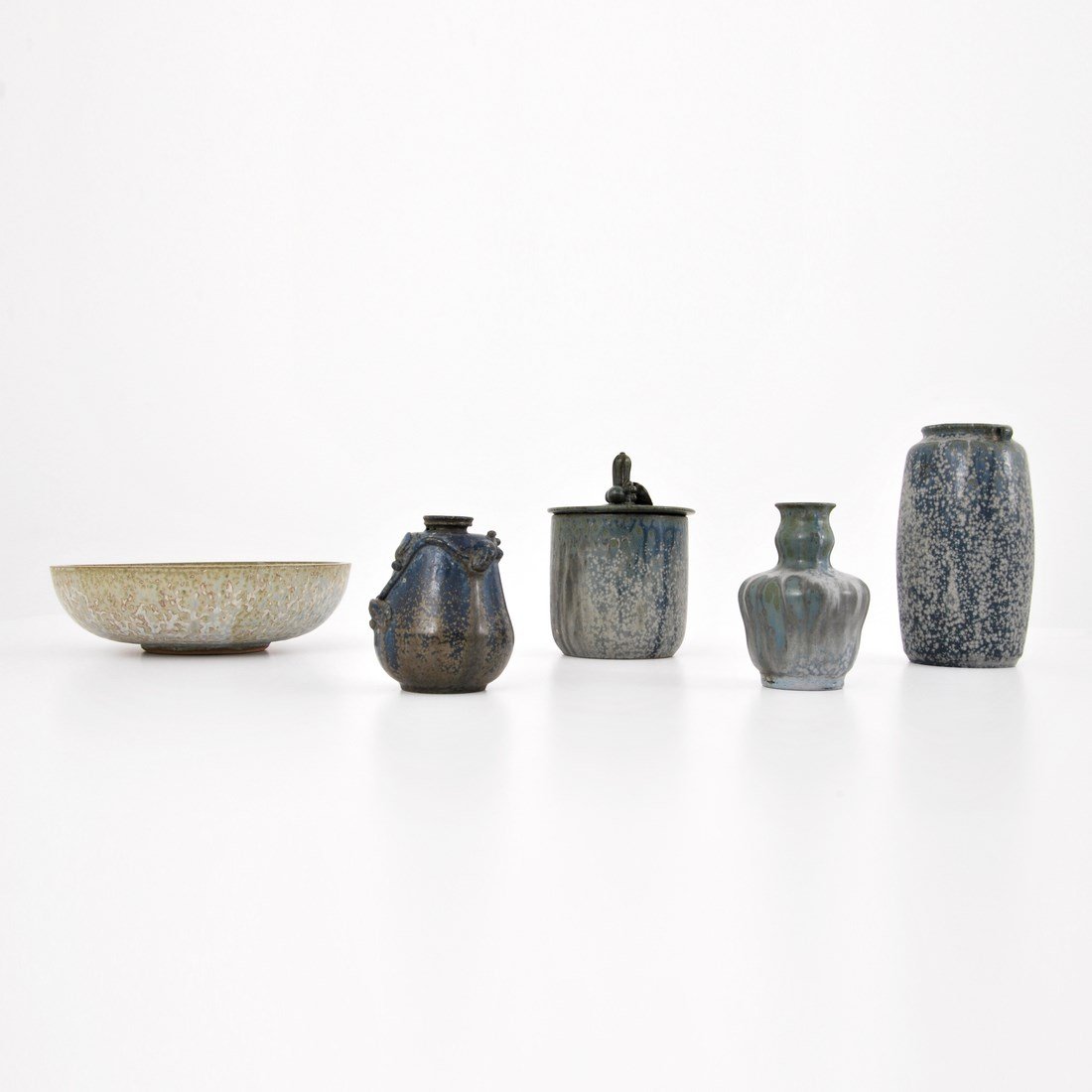 Arne Bang Vessels, Collection of 5: Designer & Manufacturer: Arne Bang Markings: marked Country of Origin & Materials: Denmark; glazed stoneware Additional Information & Circa: Collection of five vessels including three vases, lidded ve
