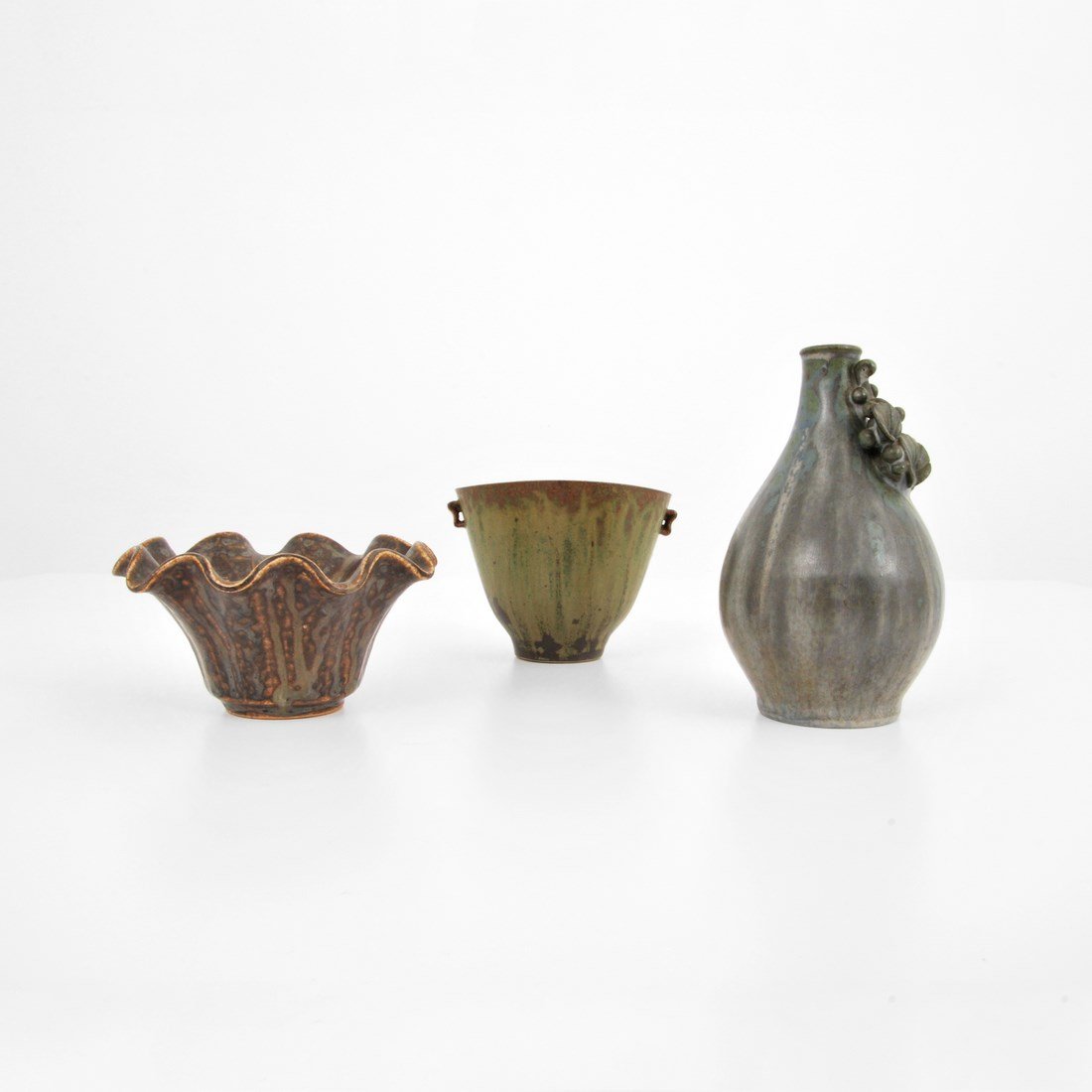Collection of Arne Bang Vessels: Designer & Manufacturer: Arne Bang Markings: marked Country of Origin & Materials: Denmark; glazed stoneware Additional Information & Circa: Collection of three vessels, two vessels are studio works,
