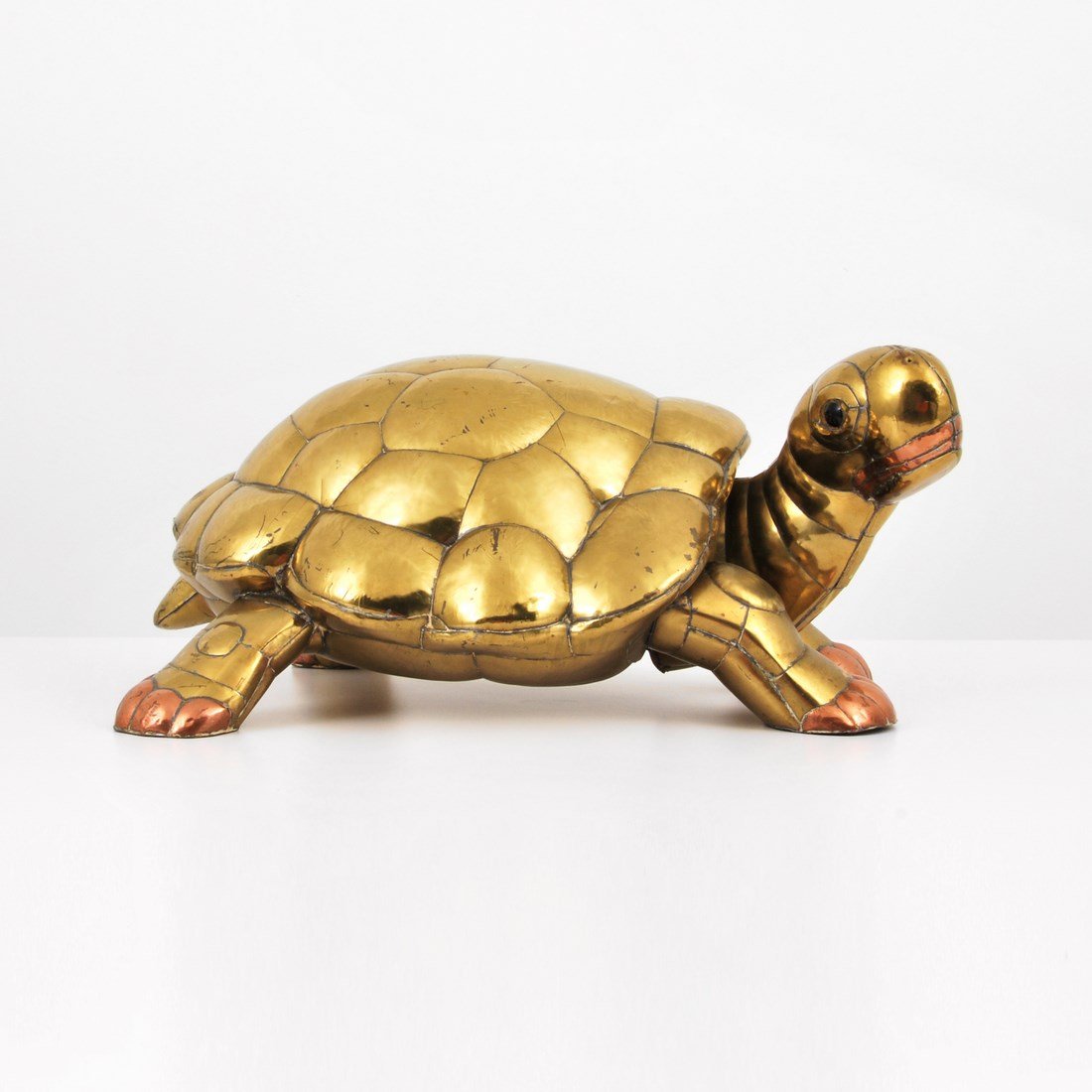 Large Sergio Bustamante Turtle Sculpture: Designer & Manufacturer: Sergio Bustamante Markings: signed; e. 42/100; 1984 Country of Origin & Materials: Mexican; mixed metals Additional Information & Circa: Large turtle sculpture by Sergio Busta
