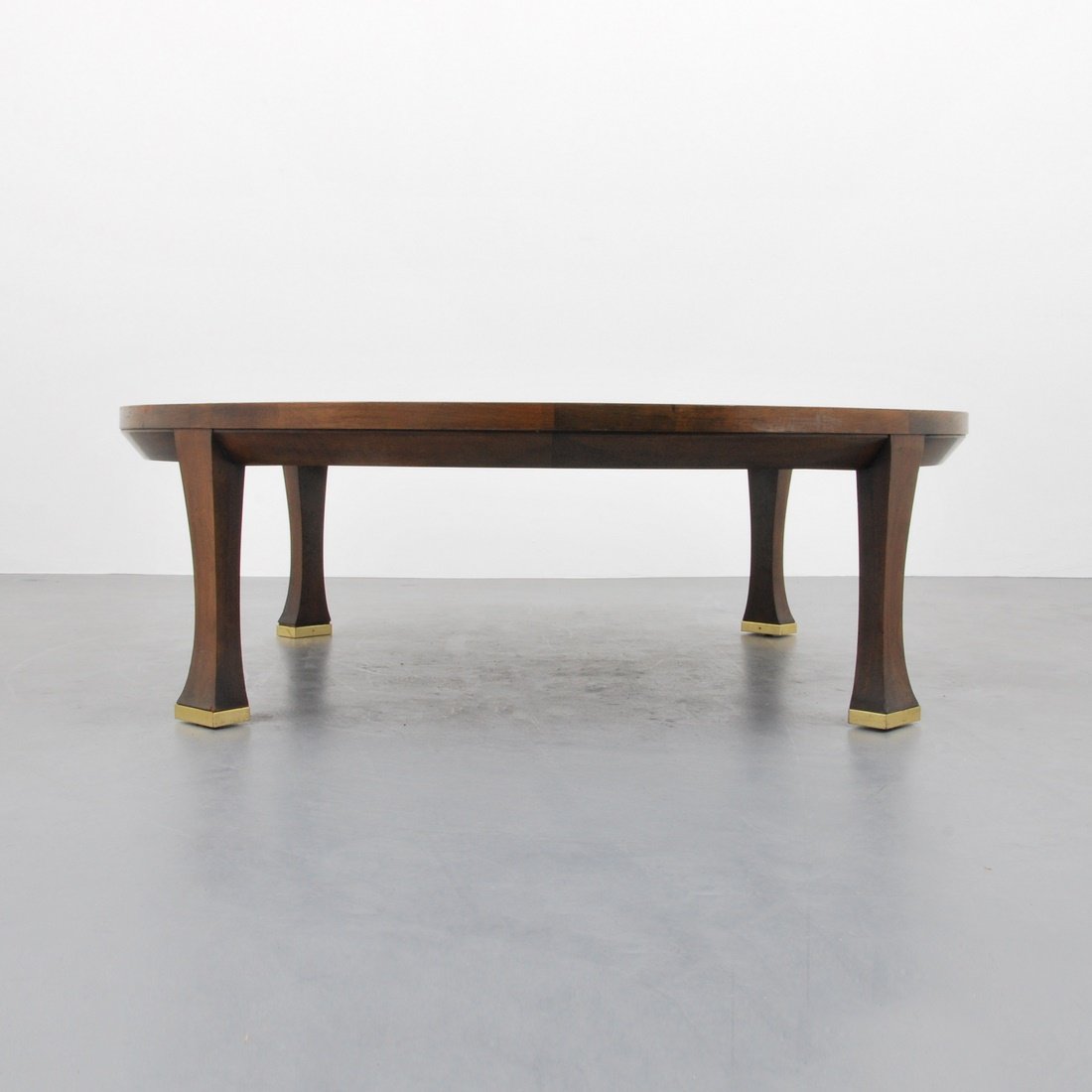 Large Michael Taylor Coffee Table: Designer & Manufacturer: Michael Taylor; Baker Furniture Co. Markings: marked Country of Origin & Materials: USA; wood, brass Additional Information & Circa: Large cocktail table with nicely grained t
