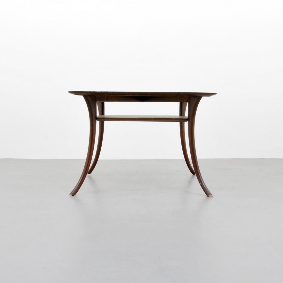 T.H. Robsjohn-Gibbings Occasional Table: Designer & Manufacturer: T.H. Robsjohn-Gibbings; Widdicomb Markings: marked Country of Origin & Materials: USA; wood Additional Information & Circa: Occasional/side/end table with splayed legs by T.H.