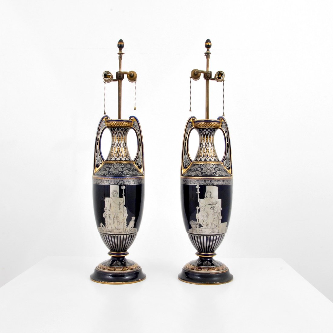 Grosfeld House Lamps: Designer & Manufacturer: Grosfeld House Markings: none Country of Origin & Materials: USA; ceramic Additional Information & Circa: Pair of neoclassical table lamps by Grosfeld House. (Key Word Search: