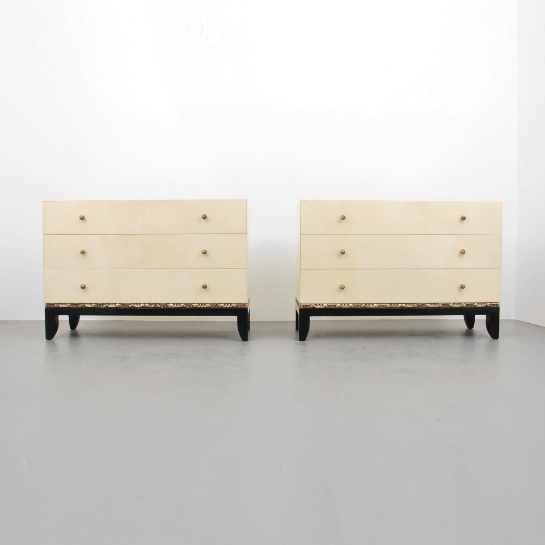 Today's Custom Design, Inc. Dressers: Designer & Manufacturer: Today's Custom Design, Inc. Markings: marked Country of Origin & Materials: USA/Colombia; parchment/goatskin (possibly faux), wood, metal Additional Information & Circa: Pair 