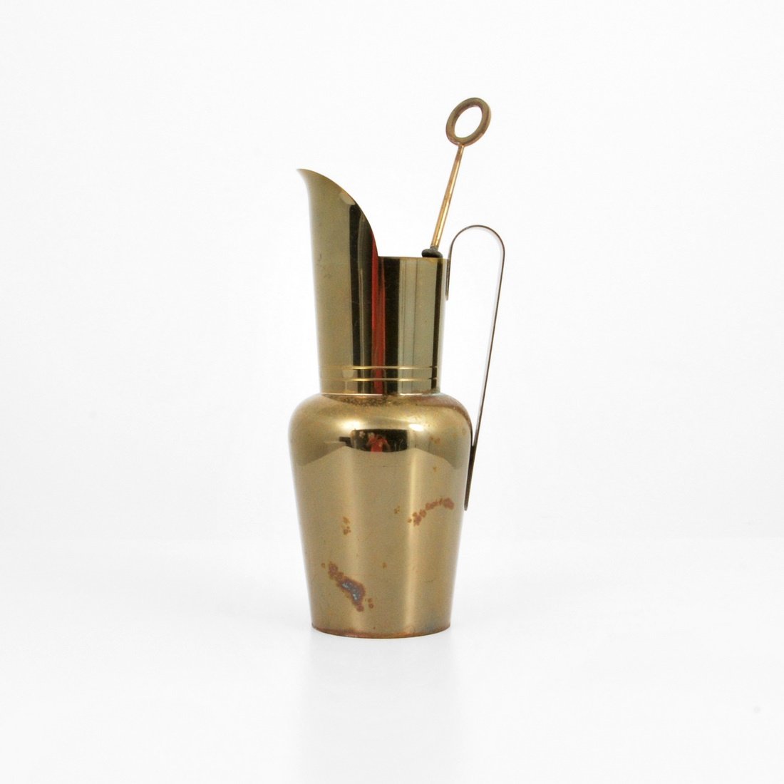 Tommi Parzinger Martini Pitcher & Stirrer: Designer & Manufacturer: Tommi Parzinger; Dorlyn Silversmiths Markings: marked Country of Origin & Materials: USA; brass Additional Information & Circa: Martini pitcher and stirrer by Tommi Parzinger.