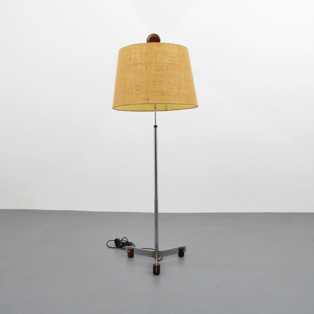 Sergio Rodrigues 'Sergio Augusto' Floor Lamp: Designer & Manufacturer: Sergio Rodrigues Markings: none; 1965 Country of Origin & Materials: Brazil; chrome-plated steel, jacaranda, shade Additional Information & Circa: Floor lamp 'Luminaria Sergio