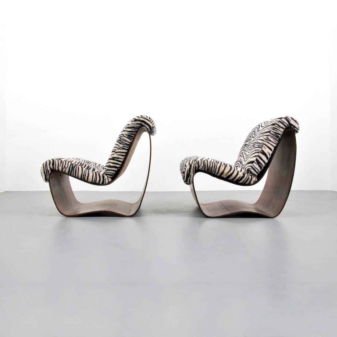 Lounge Chairs, Manner of Willy Guhl: Designer & Manufacturer: Willy Guhl, Manner of Markings: none Country of Origin & Materials: unknown; wood, upholstery Additional Information & Circa: Pair of sculptural lounge chairs in the manner of