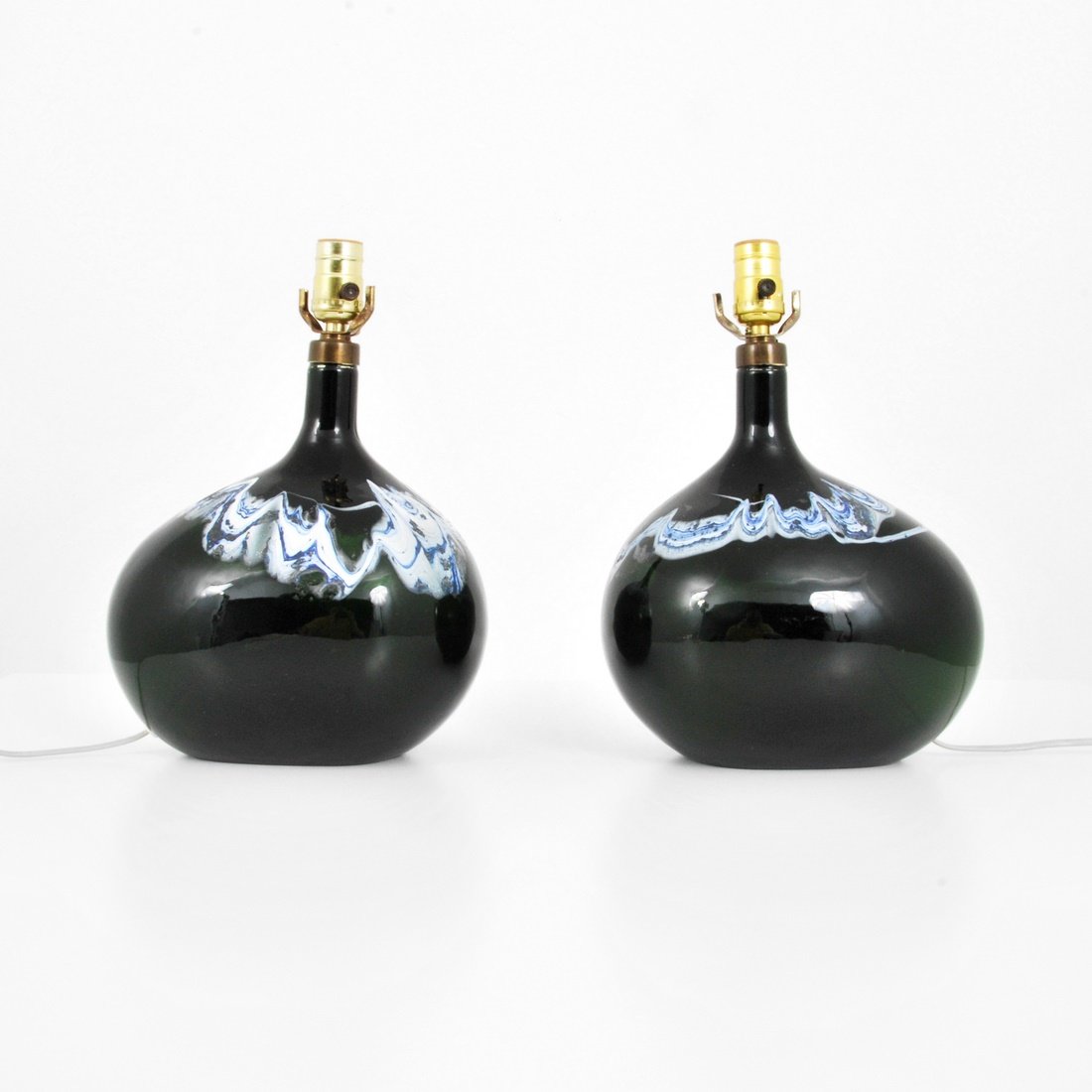 Michael Bang Lamps: Designer & Manufacturer: Michael Bang; Holmegaard Markings: marked Country of Origin & Materials: Denmark; glass, metal Additional Information & Circa: Pair of lamps from the 'Lamp Art' series by Mich