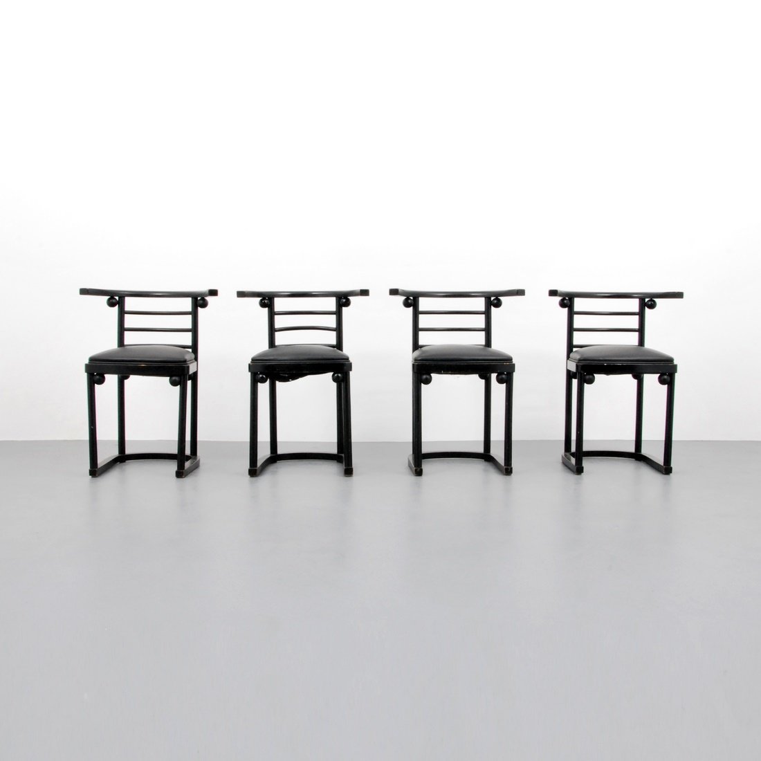 Joseph Hoffman Bentwood Chairs: Designer & Manufacturer: Joseph Hoffman; Thonet Markings: marked Country of Origin & Materials: USA; wood, leather Additional Information & Circa: Set of four bentwood dining/side chairs by Joseph Hof
