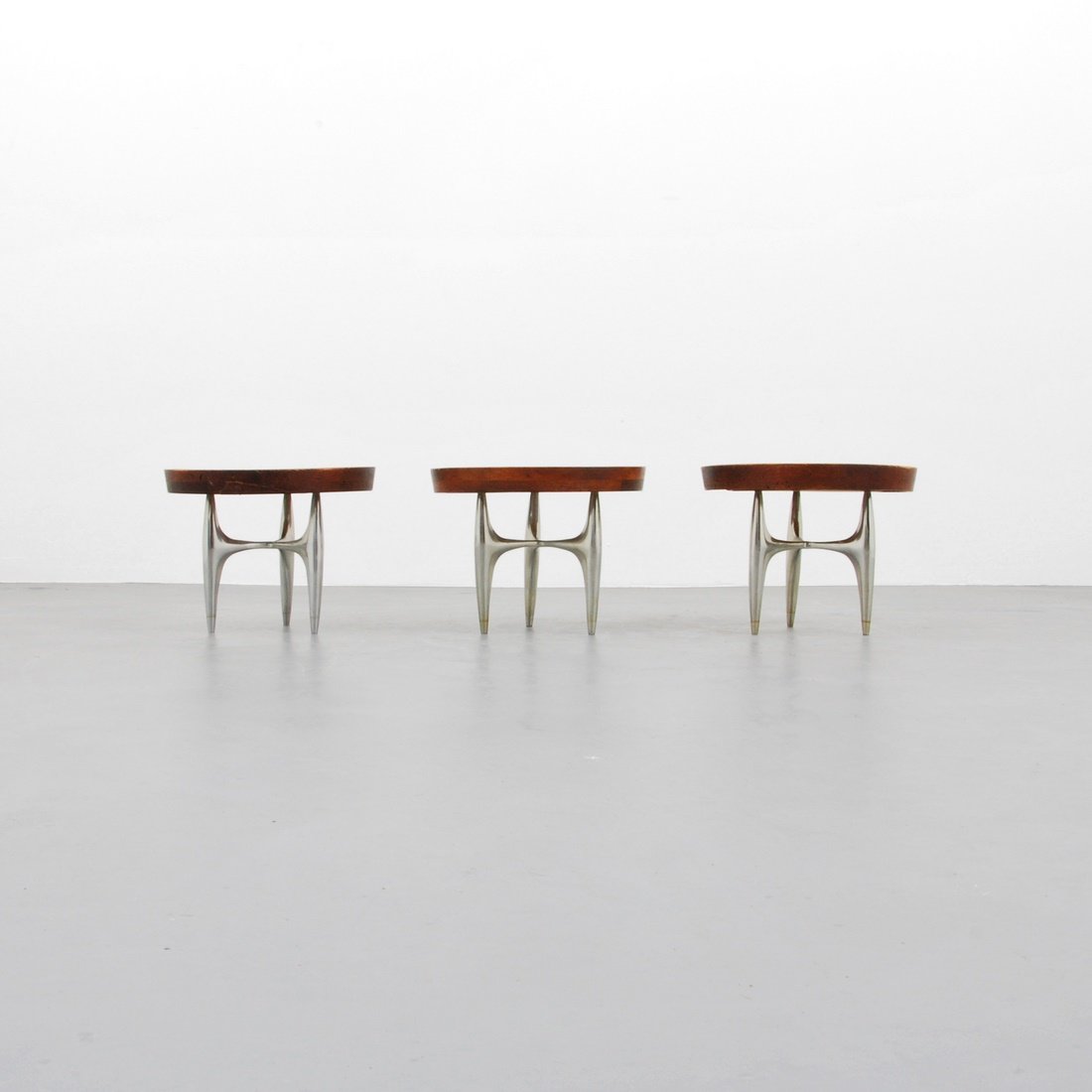 Donald Deskey Drink/End Tables: Designer & Manufacturer: Donald Deskey; Charak Modern Markings: none Country of Origin & Materials: USA; aluminum, mahogany, Micarta laminate Additional Information & Circa: Set of three drink/end/sid