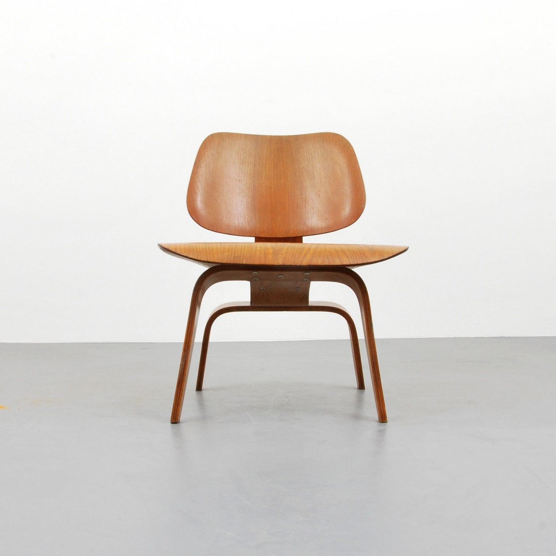 Charles & Ray Eames 'LCW' Chair: Designer & Manufacturer: Charles & Ray Eames; Herman Miller Markings: none Country of Origin & Materials: USA; wood, other Additional Information & Circa: Lounge chair 'LCW' by Charles and Ray Eames.