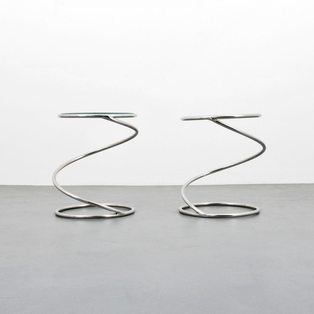 End Tables 'Spring' Attributed to Pace Collection: Designer & Manufacturer: Pace Collection, Attributed Markings: none Country of Origin & Materials: USA; chromed metal, glass Additional Information & Circa: Pair of 'Spring' side/end tables attributed