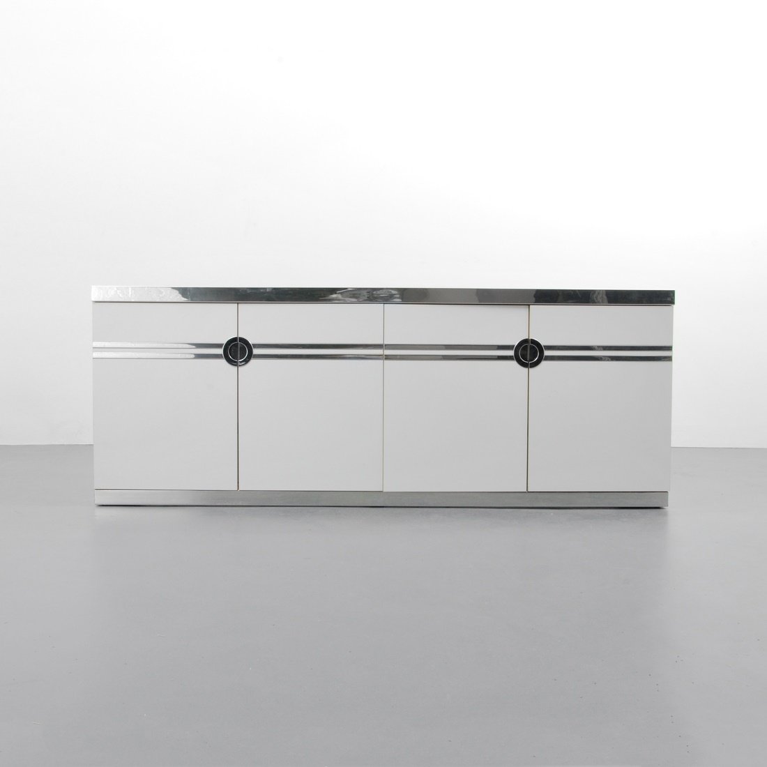 Pierre Cardin Cabinet: Designer & Manufacturer: Pierre Cardin Markings: marked Country of Origin & Materials: France; laminate, chrome Additional Information & Circa: Cabinet/dresser with two sets of doors each revealing th