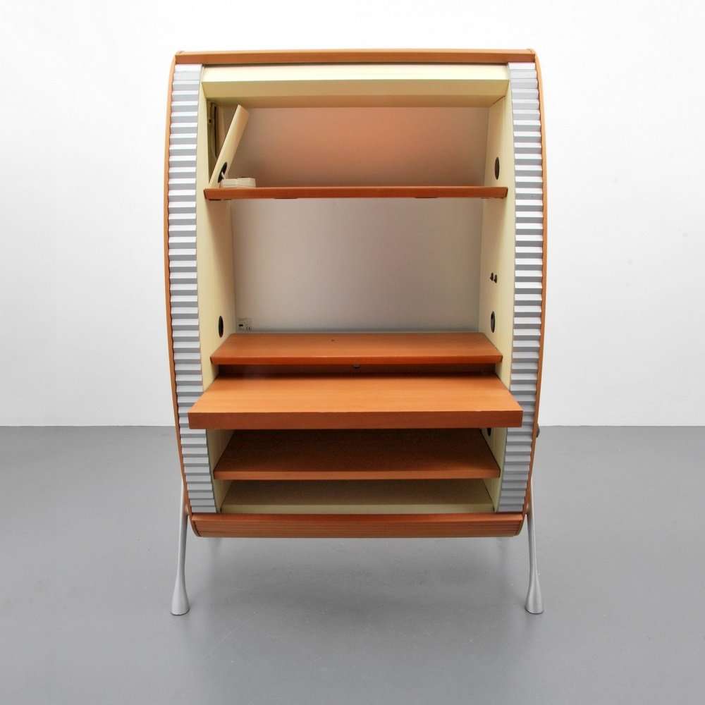 Tagliabue Roll-Top Desk/Bar: Designer & Manufacturer Tagliabue; Cozza e Mascheroni Markings marked Country of Origin & Materials Italy; wood, metal, other Additional Information & Circa Roll-top desk features three shelves and