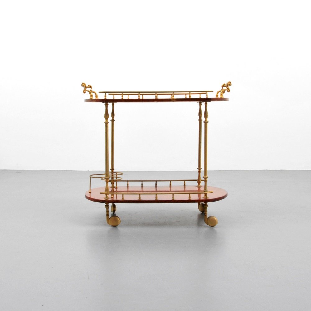 Aldo Tura Bar Cart: Designer & Manufacturer Aldo Tura Markings none Country of Origin & Materials Italy; lacquered goatskin, brass Additional Information & Circa Cart is two-tier with wheels. (Key Word Search: James Mo