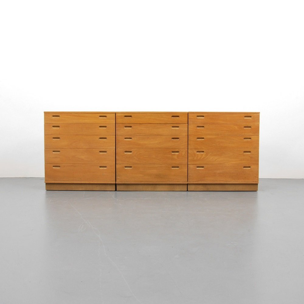 Edward Wormley Chests/Dressers: Designer & Manufacturer Edward Wormley; Dunbar Markings marked Country of Origin & Materials USA; wood Additional Information & Circa Three cabinets, each with five drawers and separators. (Key Word