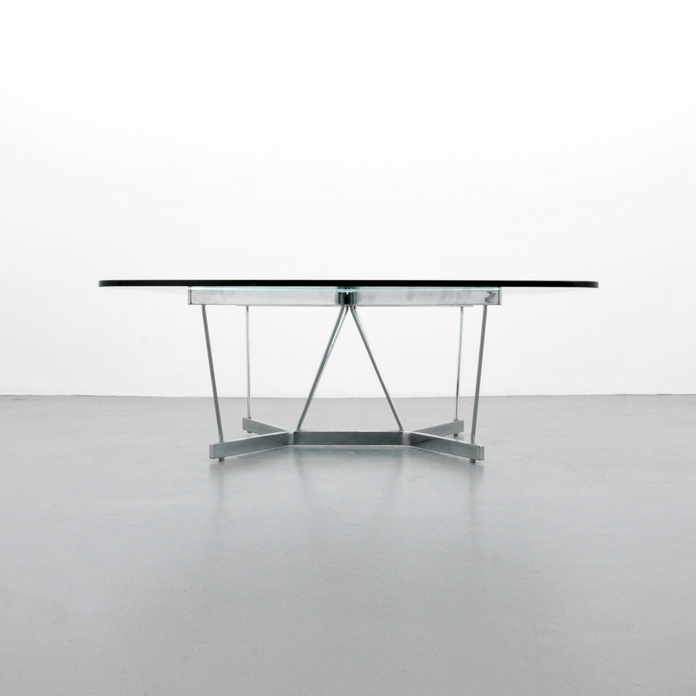 George Nelson Coffee Table: Designer & Manufacturer George Nelson; Herman Miller Markings marked Country of Origin & Materials USA; chromed metal, glass Additional Information & Circa Table is model "Catenary". Reference: Clas