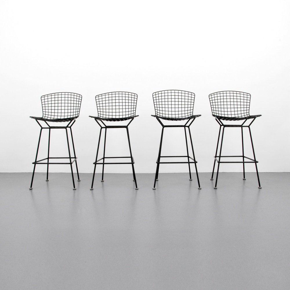Early Harry Bertoia Bar Stools: Designer & Manufacturer Harry Bertoia; Knoll International Markings marked Country of Origin & Materials USA; enamel on metal Additional Information & Circa Set of four. Reference: Knoll - A Moderni