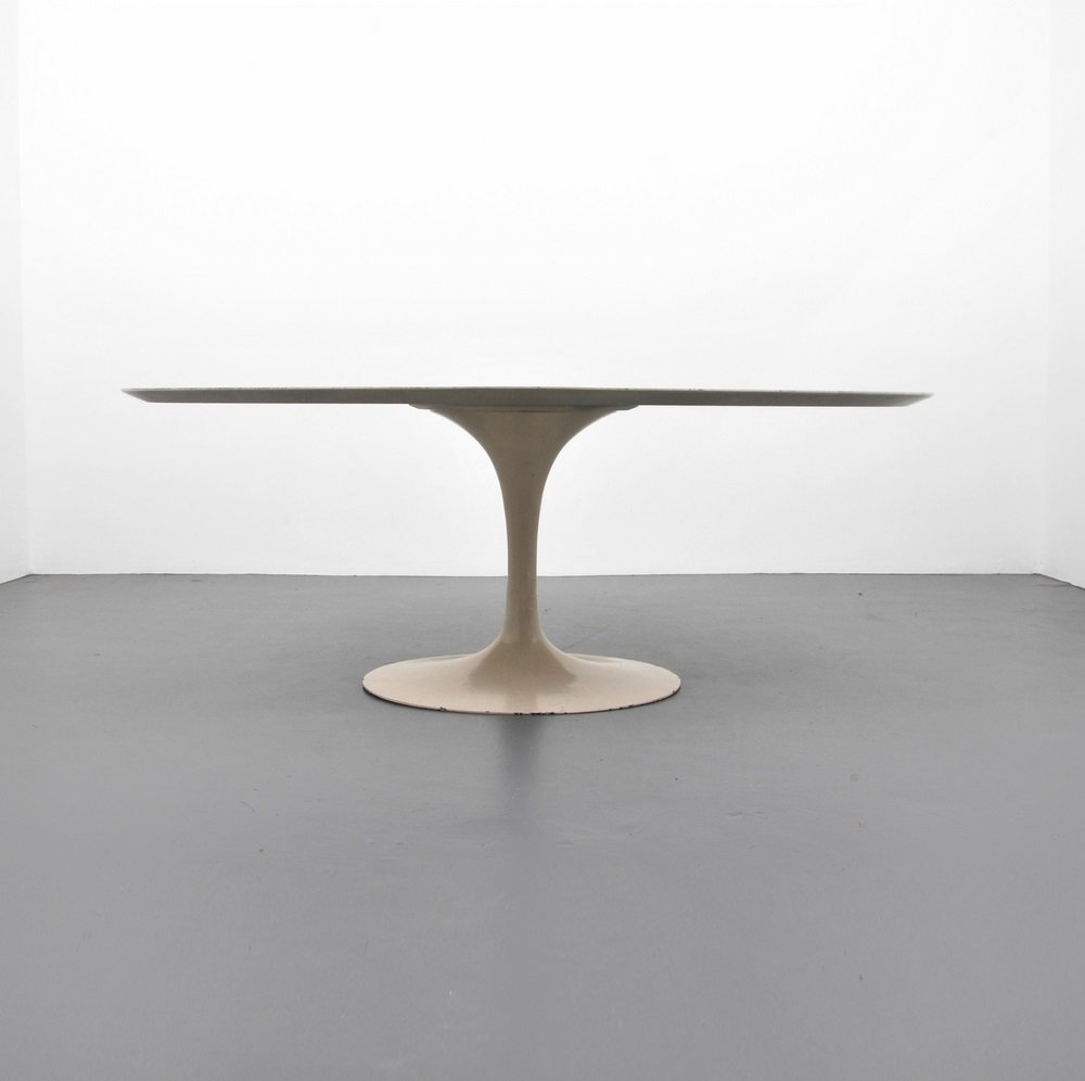 Large Eero Saarinen Dining Table: Designer & Manufacturer Eero Saarinen; Knoll Inc. Markings none Country of Origin & Materials USA; enamel on metal, laminate, mica Additional Information & Circa Reference: Knoll - A Modernist Unive