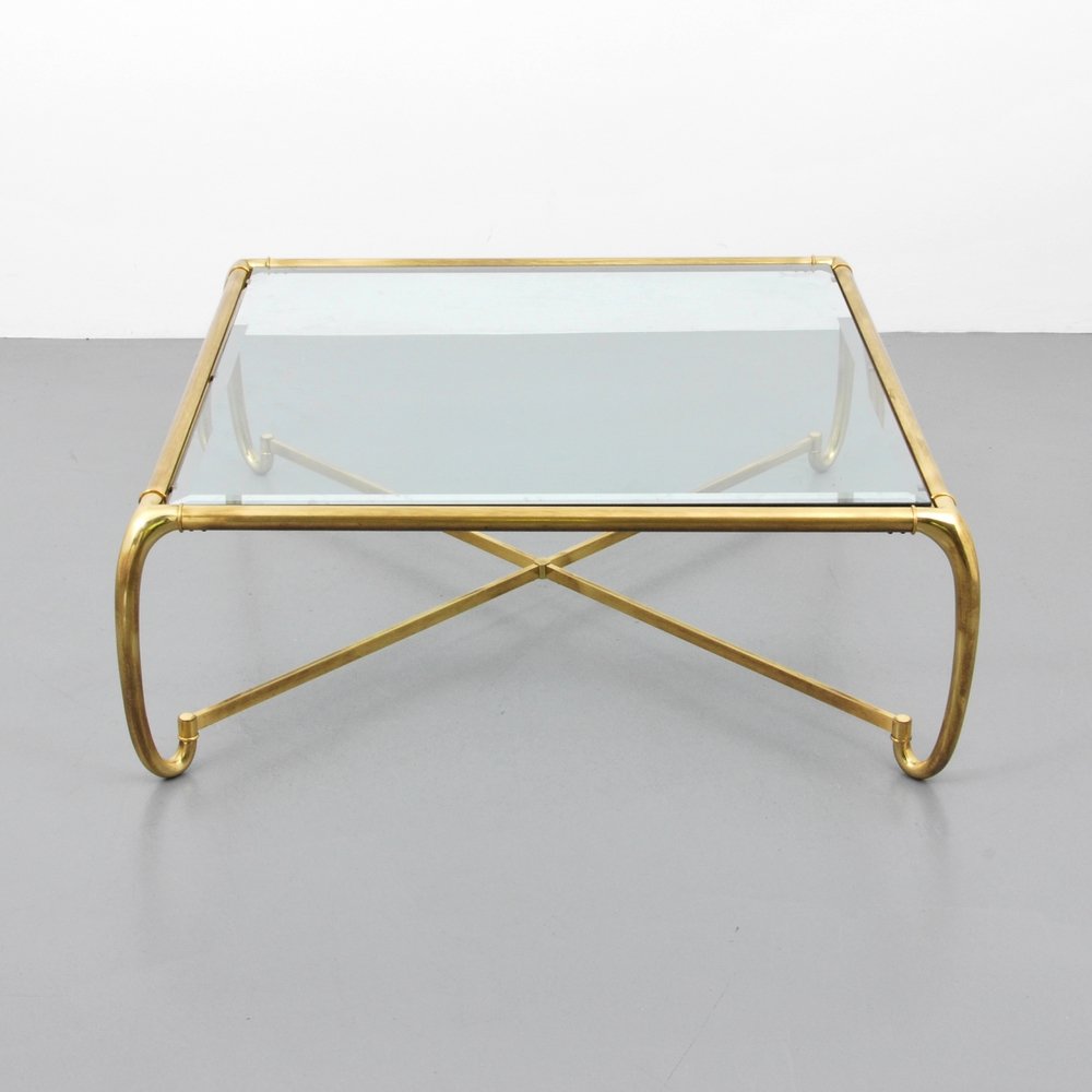 Mastercraft Coffee Table: Designer (Artist) & Manufacturer: Mastercraft Markings: none Country of Origin & Materials: USA; brass, glass Additional Information: (Key Word Search: James Mont, Serge Roche, Karl Springer, Tommi Pa