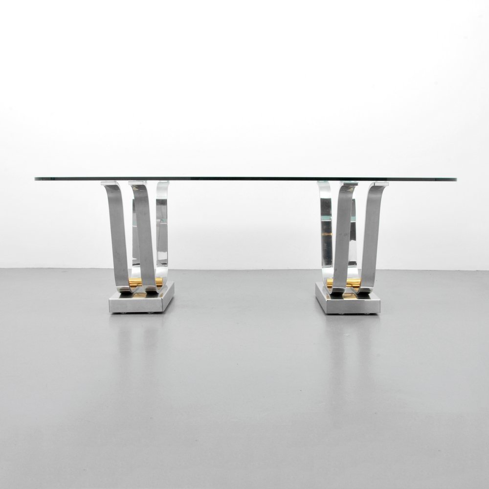 Large Karl Springer Dining Table: Designer (Artist) & Manufacturer: Karl Springer; Karl Springer Ltd. Markings: none Country of Origin & Materials: USA; glass, chromed metal, brass Additional Information: Glass top has an acid-etched