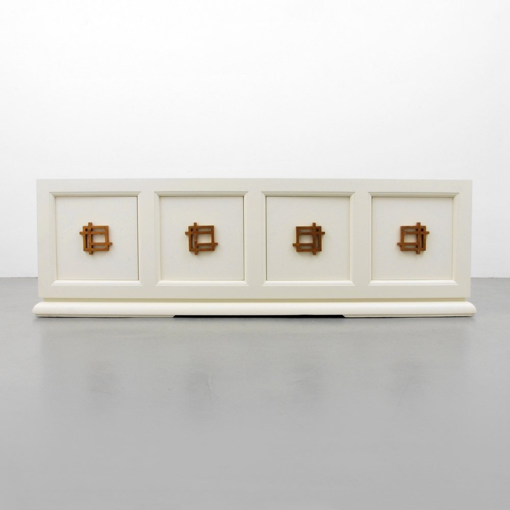 Large James Mont Cabinet: Designer (Artist) & Manufacturer: James Mont Markings: none Country of Origin & Materials: USA; wood Additional Information: Cabinet features four doors each revealing storage. (Key Word Search: James