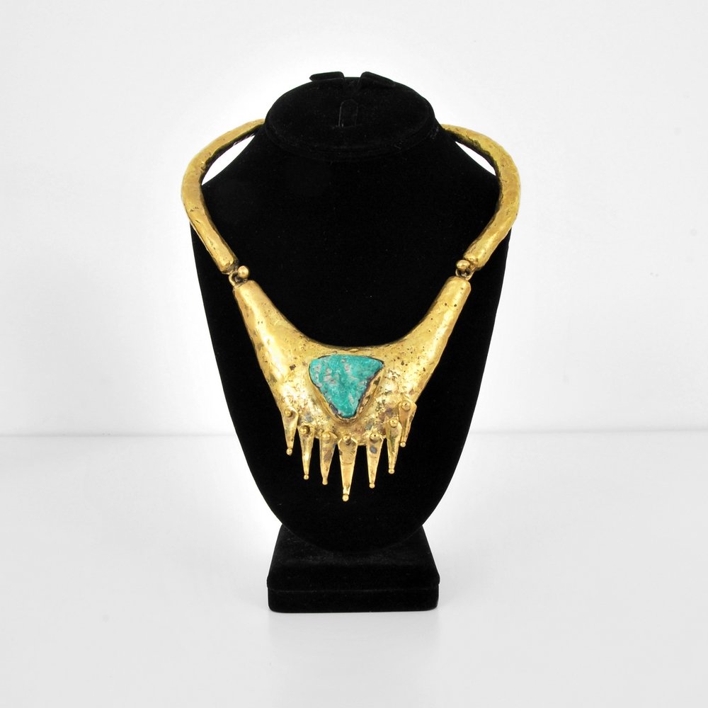 Pal Kepenyes Brutalist Necklace with Turquoise: Designer (Artist) & Manufacturer: Pal Kepenyes Markings: marked; Circa 1960s Country of Origin & Materials: Mexico; metal, turquoise Additional Information: Necklace is from a 1960s show in Acapulco.